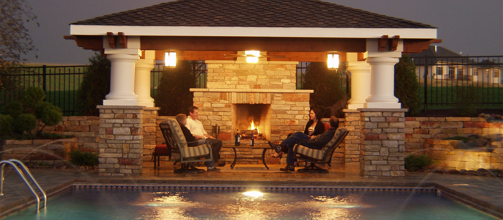 Covered Outdoor Living Room With Statement Fireplace in the Twin Cities